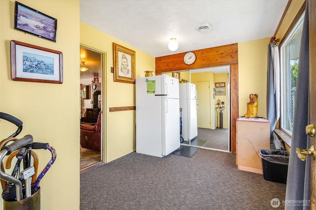 11801 Rd K NE, Moses Lake, WA 98837 - corridor featuring dark carpet and a textured ceiling