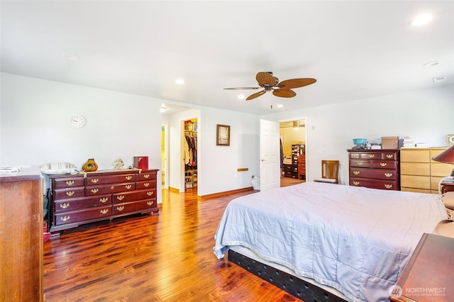 11801 Rd K NE, Moses Lake, WA 98837 - bedroom featuring wood finished floors, a walk in closet, recessed lighting, a closet, and ceiling fan