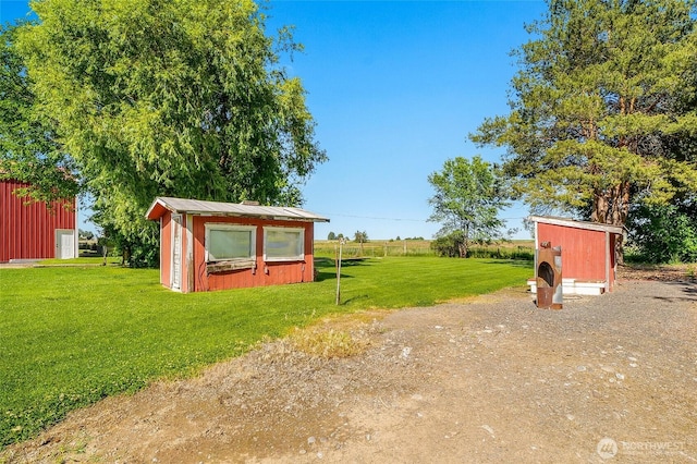 11801 Rd K NE, Moses Lake, WA 98837 - view of green lawn featuring an outbuilding
