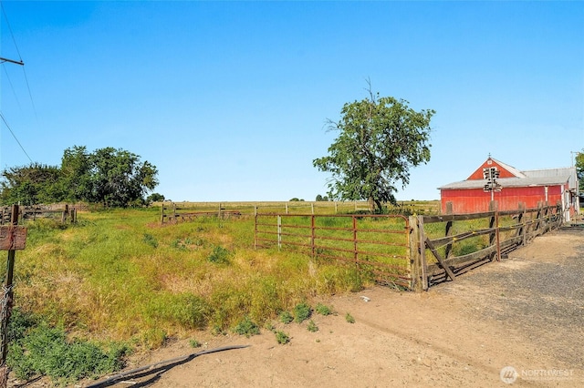 11801 Rd K NE, Moses Lake, WA 98837 - view of yard with a rural view, a barn, and an outbuilding