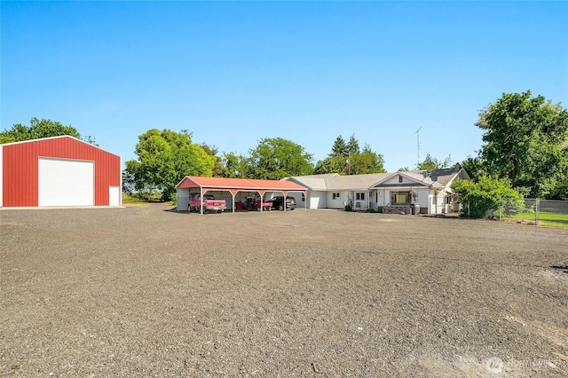 11801 Rd K NE, Moses Lake, WA 98837 - single story home featuring a carport, an outbuilding, and a garage