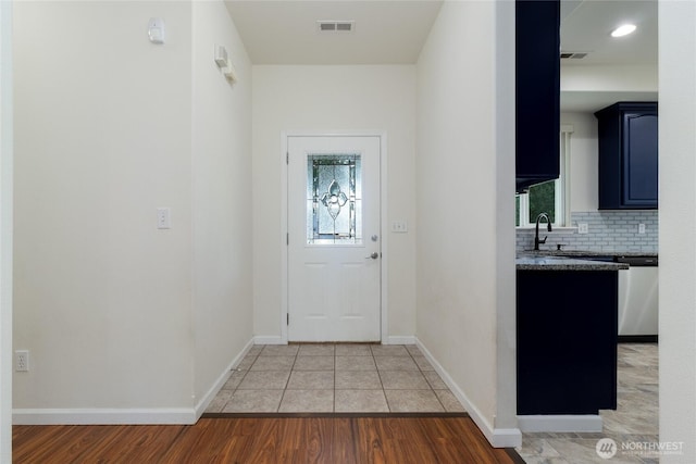 78 Cranbrook Ln, Walla Walla, WA 99362 - doorway to outside featuring light wood-style flooring and a sink