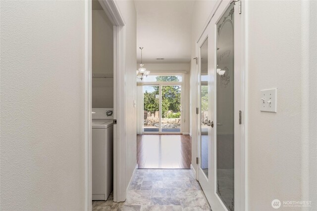 78 Cranbrook Ln, Walla Walla, WA 99362 - hall with washer / clothes dryer, stone finish floors, and a textured wall