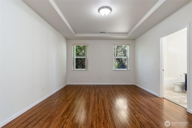 78 Cranbrook Ln, Walla Walla, WA 99362 - spare room featuring a raised ceiling and wood finished floors
