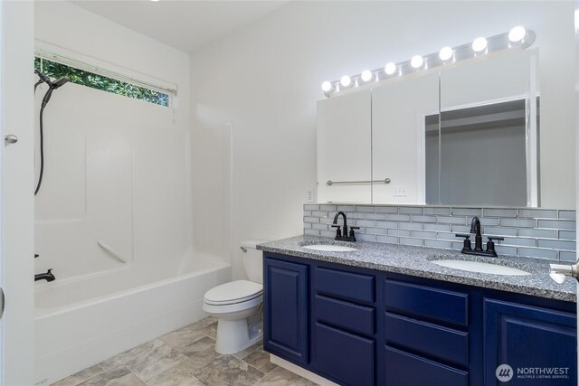 78 Cranbrook Ln, Walla Walla, WA 99362 - bathroom featuring double vanity, backsplash, and bathtub / shower combination