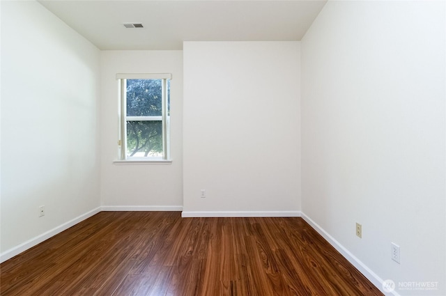 78 Cranbrook Ln, Walla Walla, WA 99362 - empty room with dark wood finished floors and baseboards