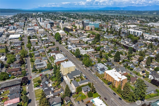 3425 Colby Ave Unit 601, Everett, WA 98201 - aerial view of property and surrounding area with nearby urban area and mountains