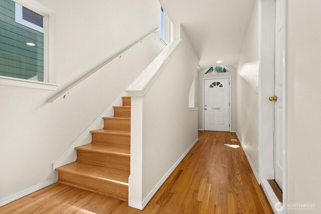 212 27th Ave E, Seattle, WA 98112 - stairway featuring wood finished floors and baseboards