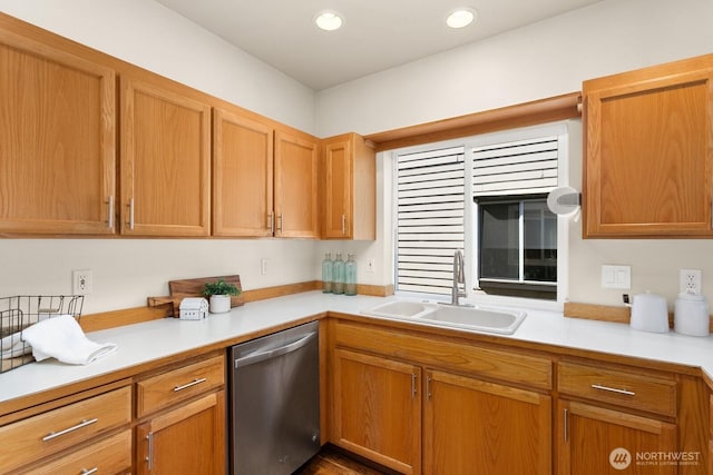 212 27th Ave E, Seattle, WA 98112 - kitchen with dishwasher, a sink, light countertops, recessed lighting, and brown cabinetry