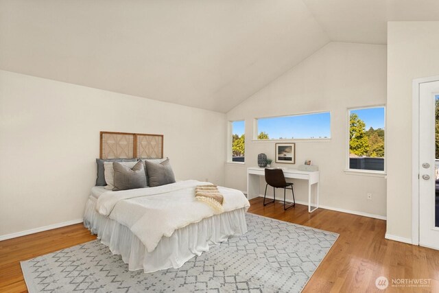 212 27th Ave E, Seattle, WA 98112 - bedroom with high vaulted ceiling, wood finished floors, and baseboards