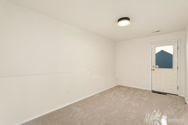 212 27th Ave E, Seattle, WA 98112 - unfurnished room featuring light colored carpet and baseboards