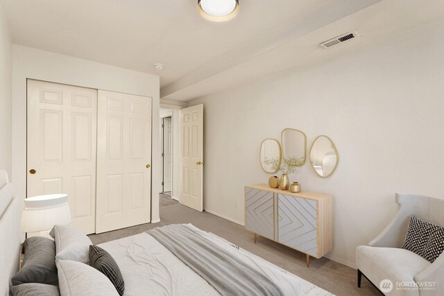 212 27th Ave E, Seattle, WA 98112 - bedroom featuring carpet floors, a closet, and baseboards