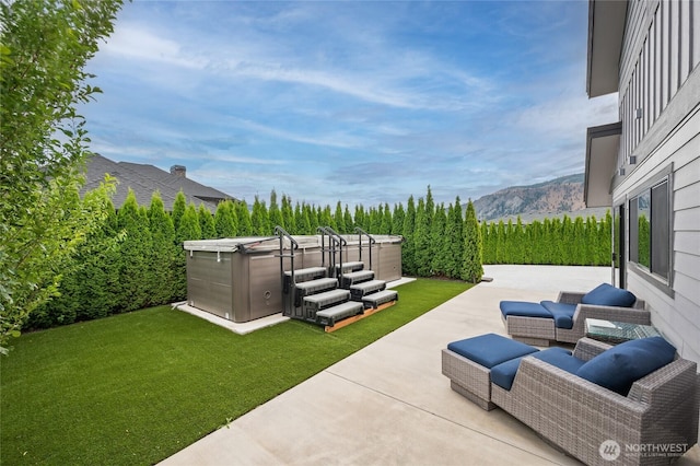 106 Shypoke Pl, Entiat, WA 98822 - view of patio / terrace with a hot tub and a mountain view