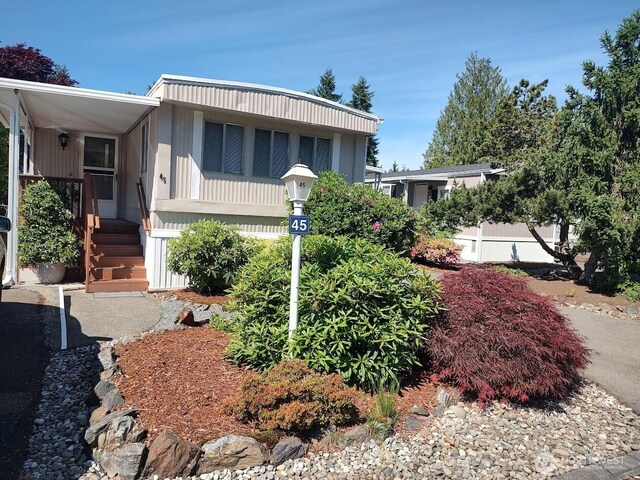 2200 196th St SE Unit 45, Bothell, WA 98012 - manufactured / mobile home featuring covered porch