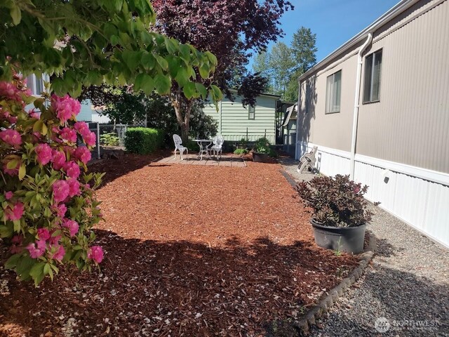 2200 196th St SE Unit 45, Bothell, WA 98012 - view of yard featuring a patio area
