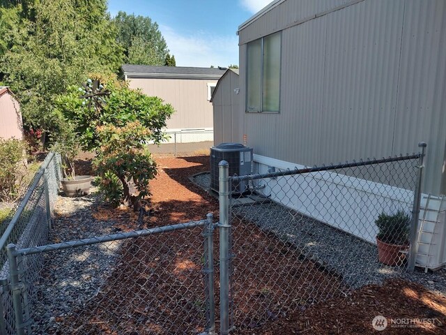 2200 196th St SE Unit 45, Bothell, WA 98012 - view of home's exterior featuring central air condition unit