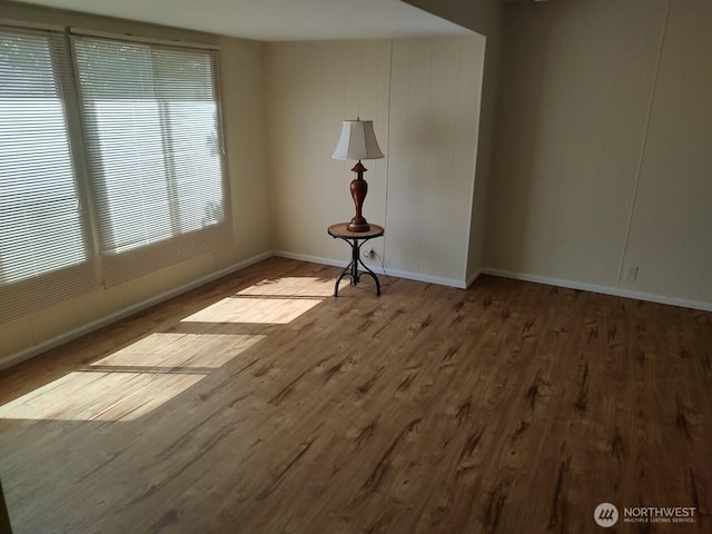 2200 196th St SE Unit 45, Bothell, WA 98012 - spare room with wood finished floors and baseboards