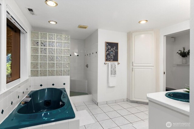21907 3rd Ave SE, Bothell, WA 98021 - bathroom featuring a jetted tub, walk in shower, vanity, tile patterned floors, and recessed lighting