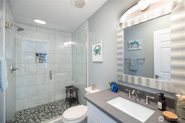 207 Moon River Vw SW, Mattawa, WA 99349 - bathroom featuring vanity, a shower stall, and toilet