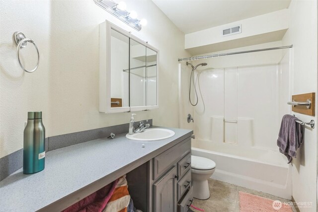 642 Sprague Valley Dr, Maple Falls, WA 98266 - full bathroom featuring toilet, bathtub / shower combination, vanity, and tile patterned floors