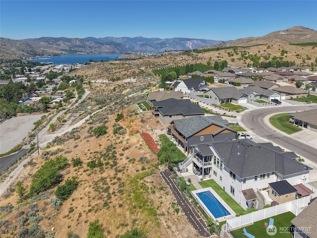 1080 Sunset Ln, Chelan, WA 98816 - aerial perspective of suburban area featuring a water and mountain view and a pool