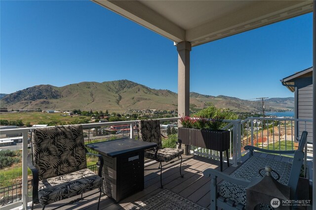 1080 Sunset Ln, Chelan, WA 98816 - wooden deck featuring a mountain view