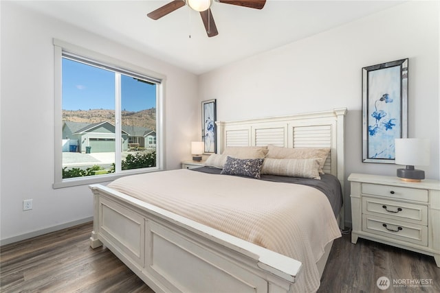 1080 Sunset Ln, Chelan, WA 98816 - bedroom with dark wood-style flooring, ceiling fan, and baseboards