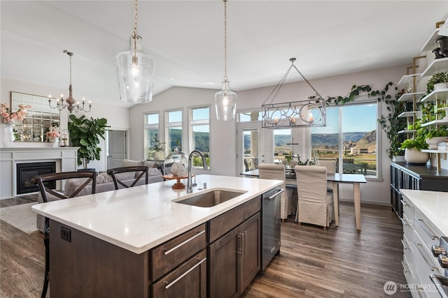 1080 Sunset Ln, Chelan, WA 98816 - kitchen featuring a sink, a chandelier, dishwasher, light countertops, and vaulted ceiling