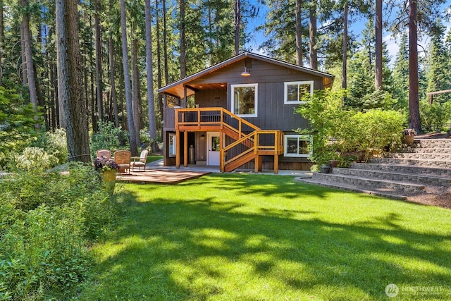 671 W Pacific Ave, Ronald, WA 98940 - back of house with stairway, a deck, a patio area, and a lawn