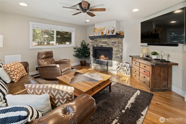 671 W Pacific Ave, Ronald, WA 98940 - living room featuring light wood-type flooring, a fireplace, a ceiling fan, baseboards, and recessed lighting