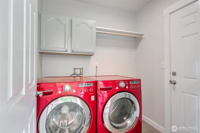 300 Cascade Ave, Granite Falls, WA 98252 - washroom featuring washing machine and dryer and cabinet space