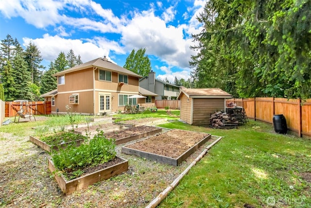 18909 SE 263rd St, Covington, WA 98042 - rear view of house featuring a garden