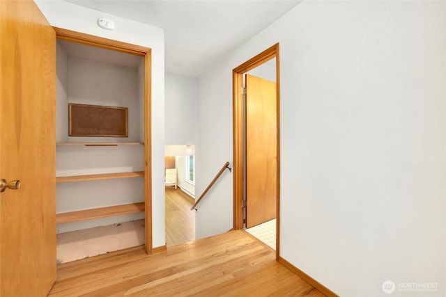 1642 Browns Point Blvd, Tacoma, WA 98422 - hall with an upstairs landing, wood finished floors, and baseboards