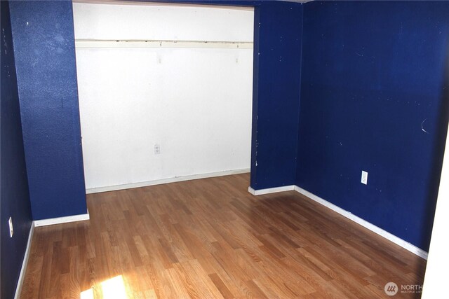 18343 Albany St SW, Rochester, WA 98579 - unfurnished bedroom with wood finished floors and baseboards