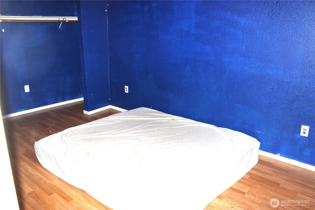 18343 Albany St SW, Rochester, WA 98579 - bedroom with baseboards and wood finished floors
