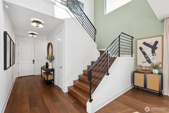 15306 204th Ave E Unit 23, Bonney Lake, WA 98391 - entryway featuring wood finished floors, stairs, a high ceiling, and baseboards