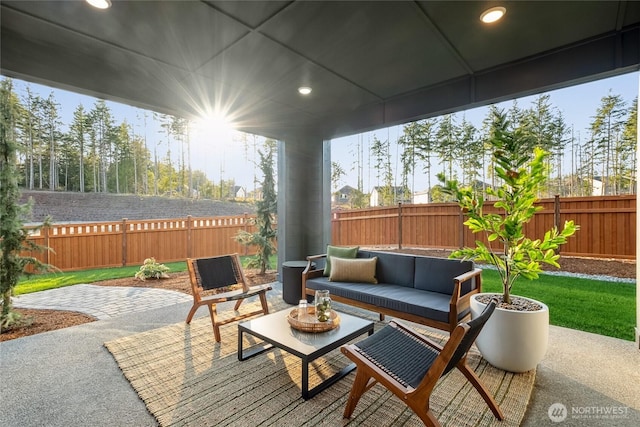 15306 204th Ave E Unit 23, Bonney Lake, WA 98391 - fenced backyard featuring a patio area and outdoor lounge area