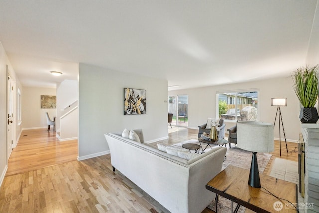 7309 134th Ave NE, Redmond, WA 98052 - living area with light wood-type flooring and baseboards