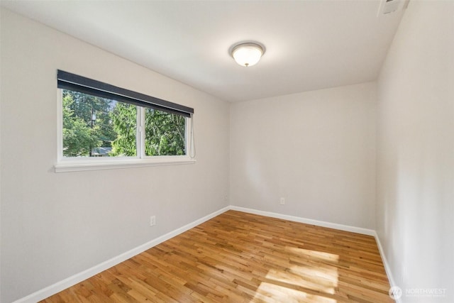 7309 134th Ave NE, Redmond, WA 98052 - empty room featuring light wood-type flooring and baseboards