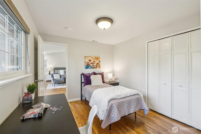 7309 134th Ave NE, Redmond, WA 98052 - bedroom featuring light wood finished floors and a closet
