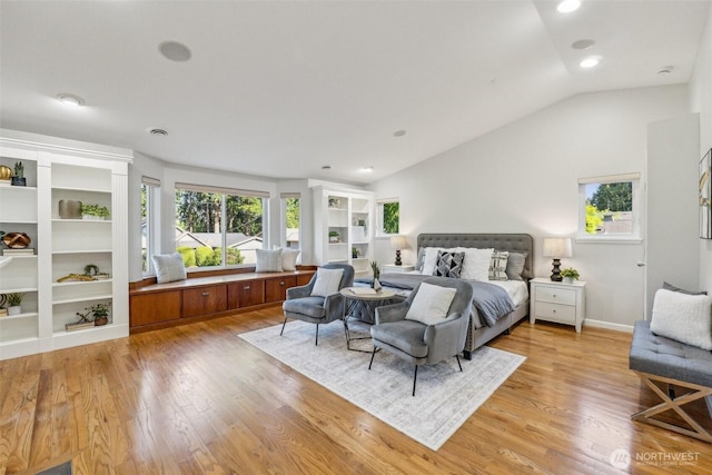 7309 134th Ave NE, Redmond, WA 98052 - bedroom with light wood-style floors, lofted ceiling, and recessed lighting
