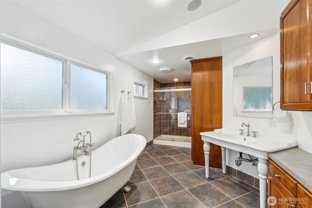 7309 134th Ave NE, Redmond, WA 98052 - bathroom with a shower stall, a soaking tub, tile patterned floors, vaulted ceiling, and baseboards