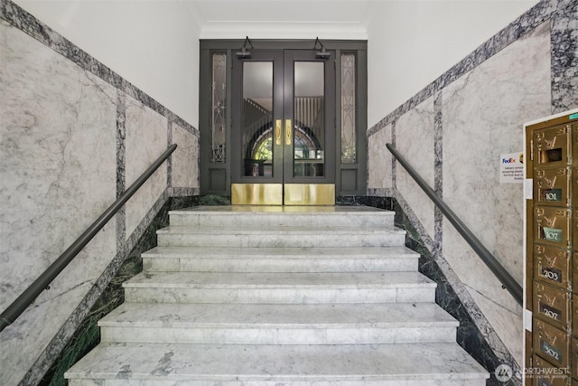 2132 5th Ave Unit 209, Seattle, WA 98121 - stairway with french doors and tile walls