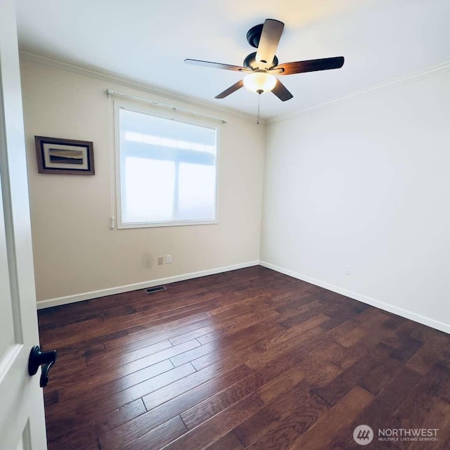 1436 Latham Ct, Dupont, WA 98327 - unfurnished room with crown molding, dark wood-style floors, ceiling fan, and baseboards