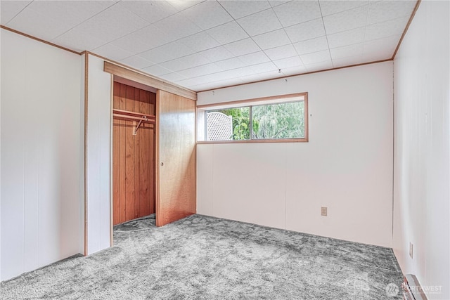 27 Poplar Ave, Wenatchee, WA 98801 - unfurnished bedroom featuring carpet flooring, a closet, and crown molding