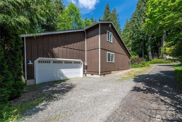 78 Honeycomb Ln, Bellingham, WA 98229 - view of home's exterior with crawl space, a garage, and gravel driveway