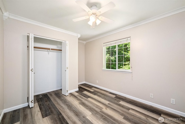 78 Honeycomb Ln, Bellingham, WA 98229 - unfurnished bedroom featuring crown molding, wood finished floors, a closet, and a ceiling fan