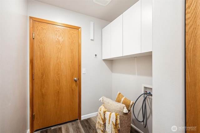 78 Honeycomb Ln, Bellingham, WA 98229 - washroom featuring cabinet space, hookup for a washing machine, and wood finished floors