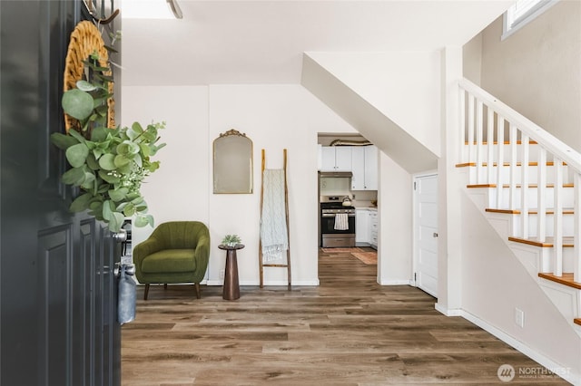 1306 E 32nd St, Tacoma, WA 98404 - entryway with dark wood-style flooring, stairway, and baseboards