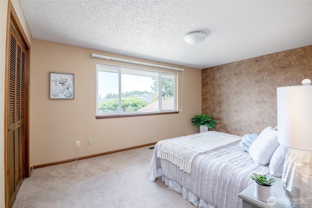 7215 N 23rd, Tacoma, WA 98406 - bedroom with light carpet, a closet, and a textured ceiling